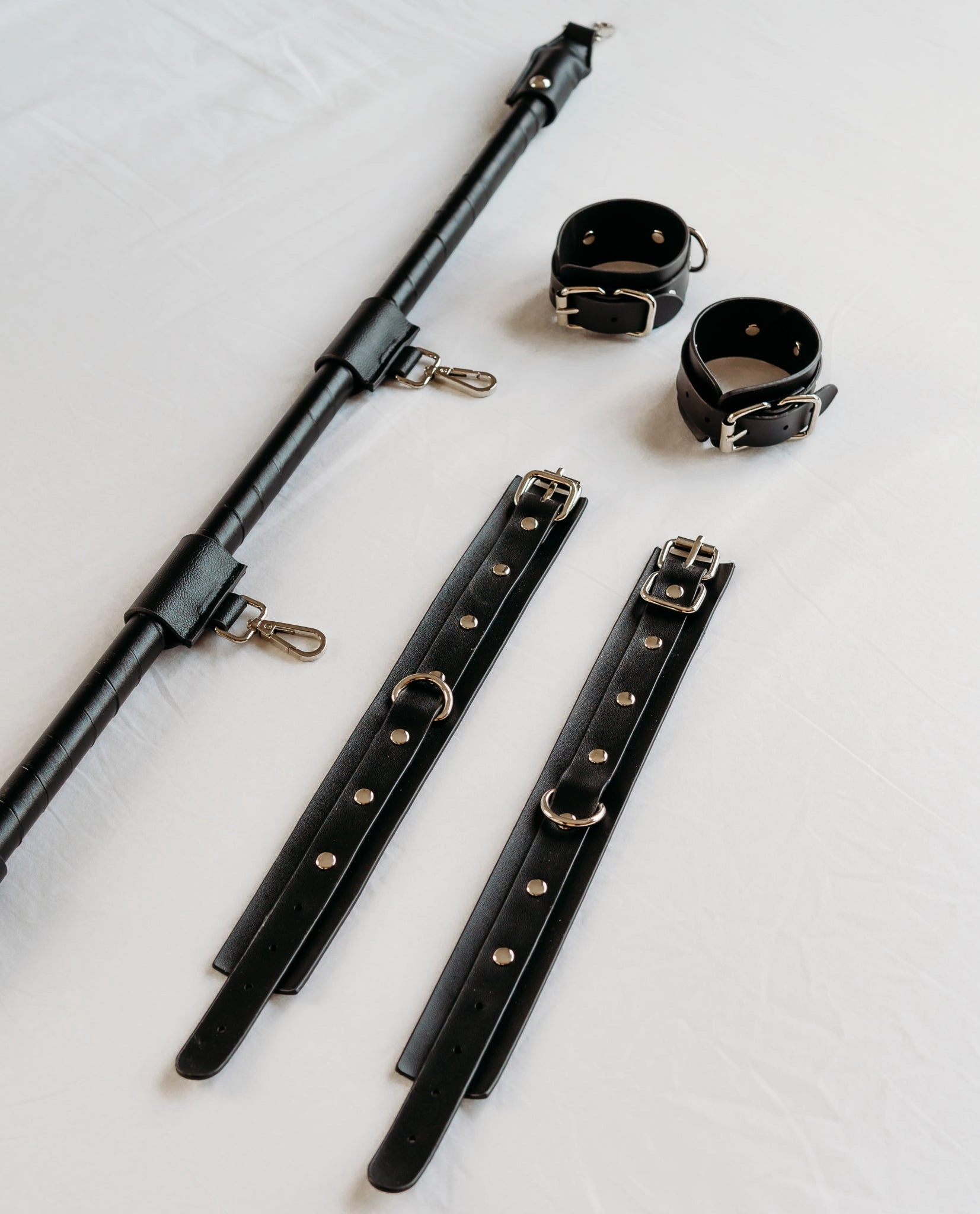 Cupid’s Faux Leather Bondage Spreader Bar with Cuffs